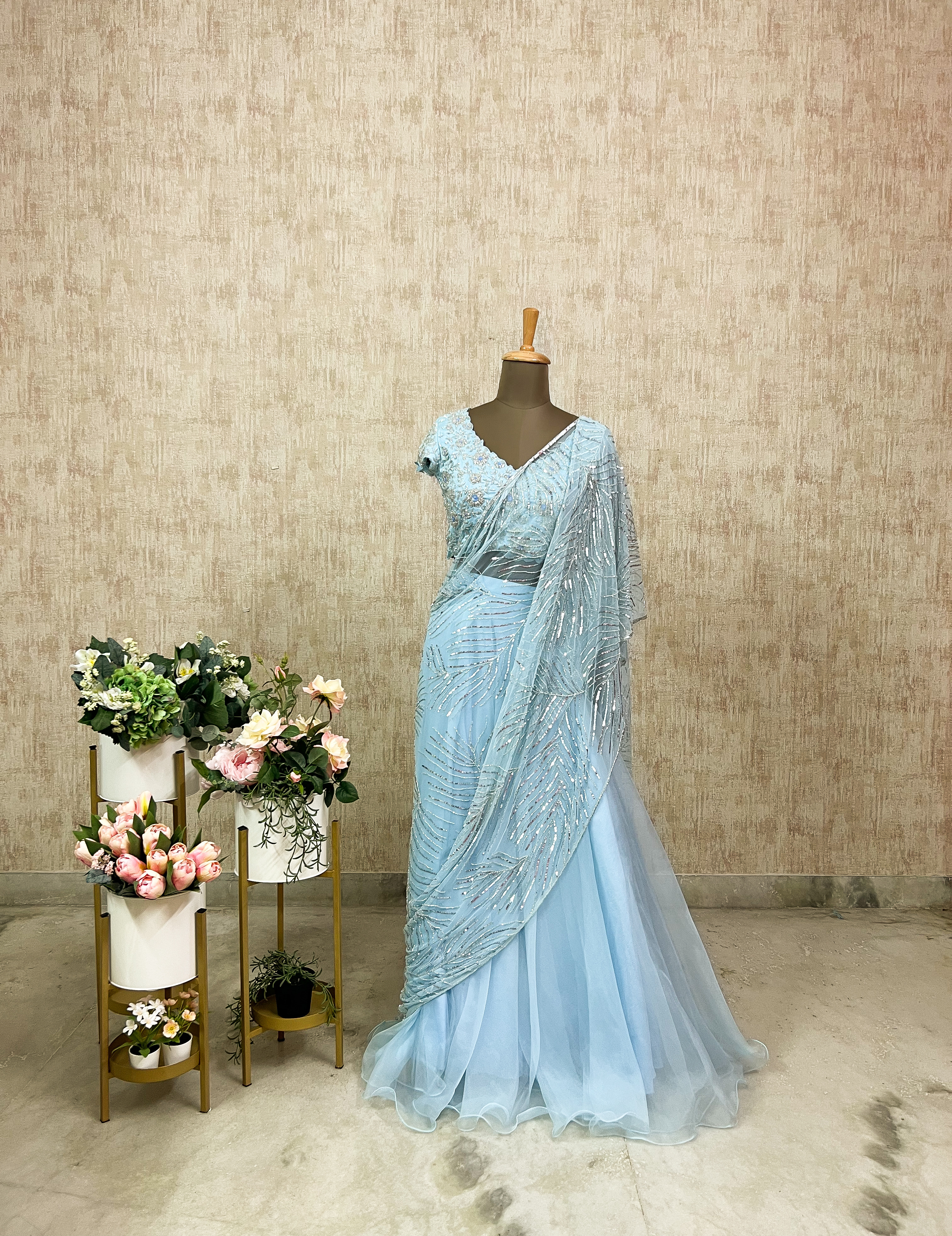 Powder Blue Net lehenga with Sequins and Floral Appliqué Blouse