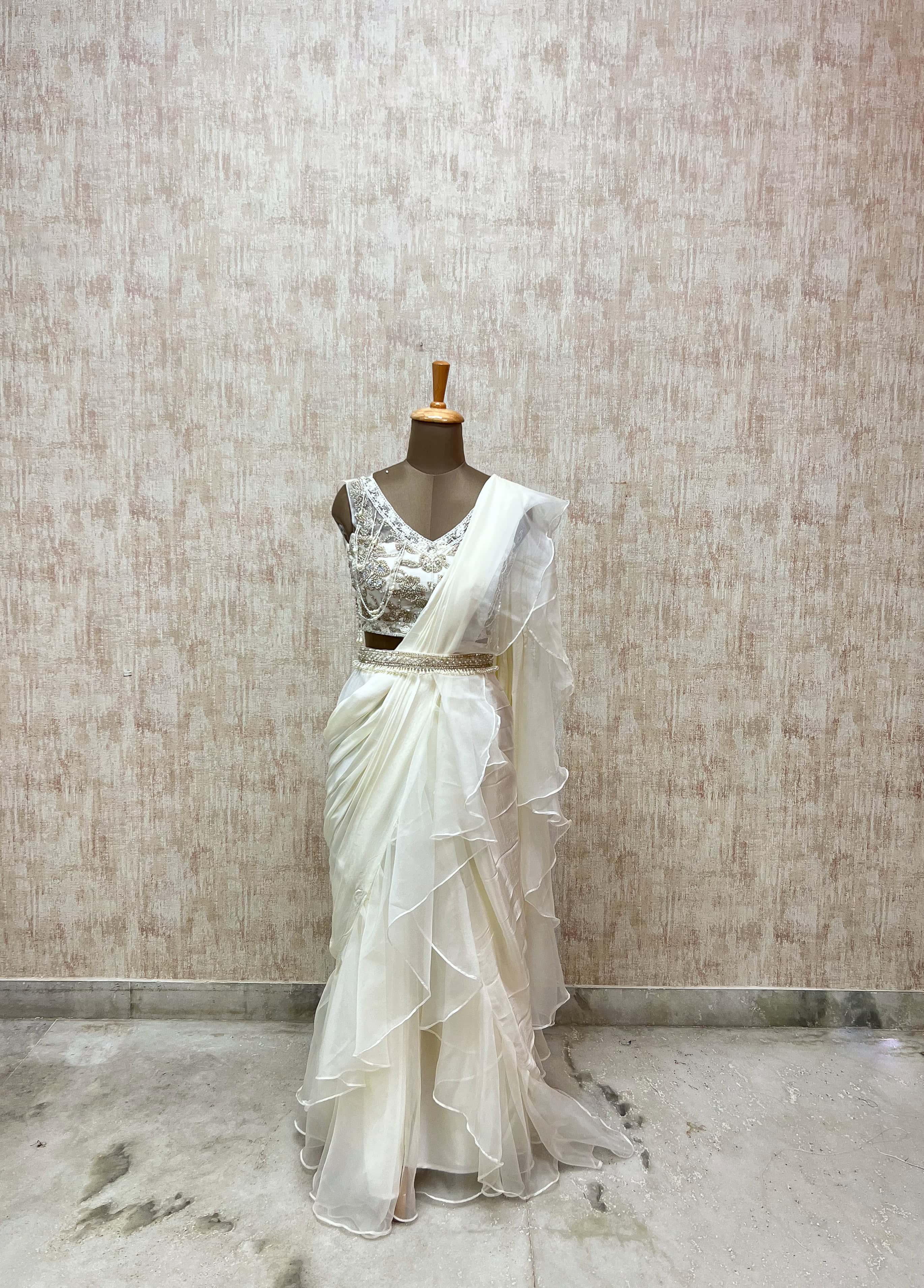 Ivory Ruffled Saree with Embroidered Blouse