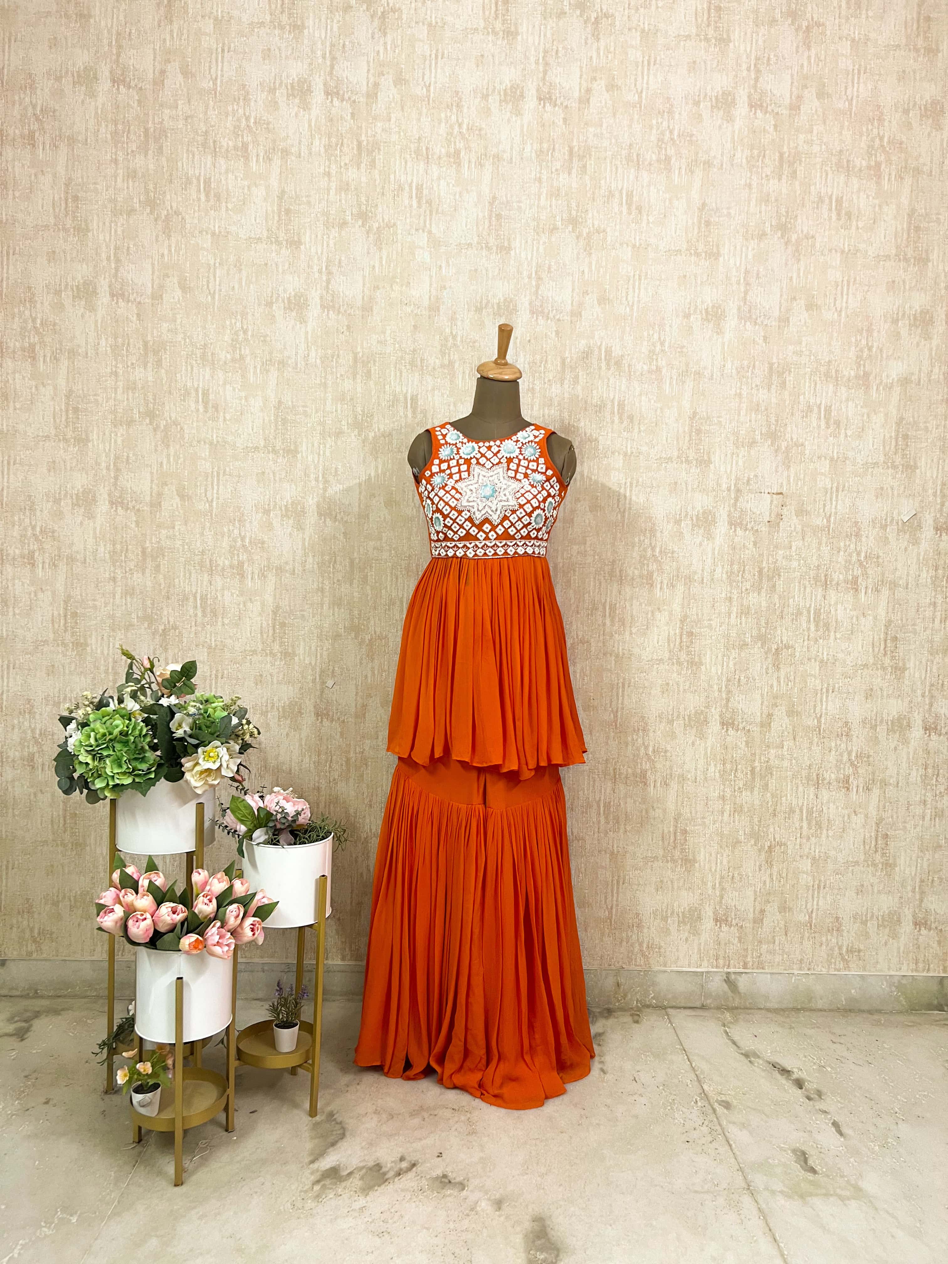 Orange embroidered peplum set